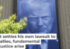 A banner featuring President Trump on the outside of the DOJ building in Washington, D.C. Andrew Harnik/Getty Images